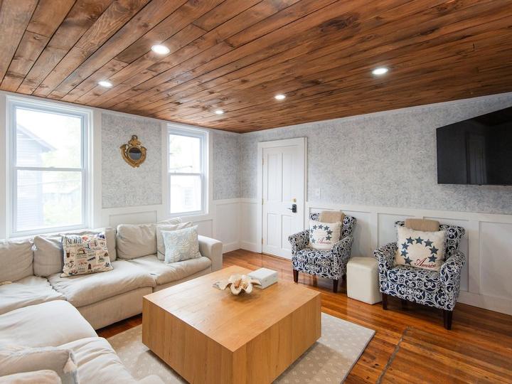 Living room with sofa and armchairs